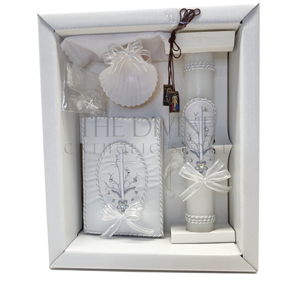 The image features a beautifully designed 6-piece baptism candle set, including a candle, a towel, rosary, bible, scapular, and a shell. The candle is adorned with white fabric, a braided nylon rope design, small white flowers, ribbon and rhinestone embellishments, giving it an elegant and sacred look. 