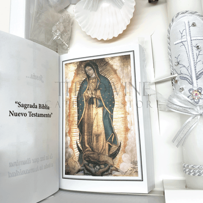 Close up of the New Testament Bible showing first page with the image of Our Lady of Guadalupe, in the 6 piece baptism candle set.