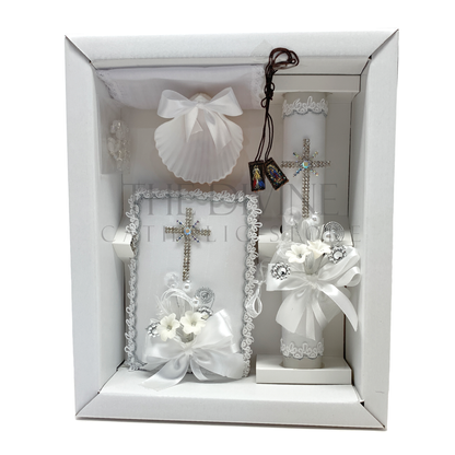 The image features a beautifully designed 6-piece baptism candle set, including a candle, a towel, rosary, bible, scapular, and a shell. The candle is adorned with white fabric, a braided nylon rope design, small white flowers, ribbon and rhinestone embellishments, giving it an elegant and sacred look. 