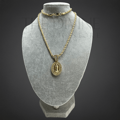 Guadalupe Rope Gold Stainless Steel Necklace featuring an oval pendant with a detailed image of Our Lady of Guadalupe, bordered by sparkling rhinestones, displayed on a sturdy rope chain.