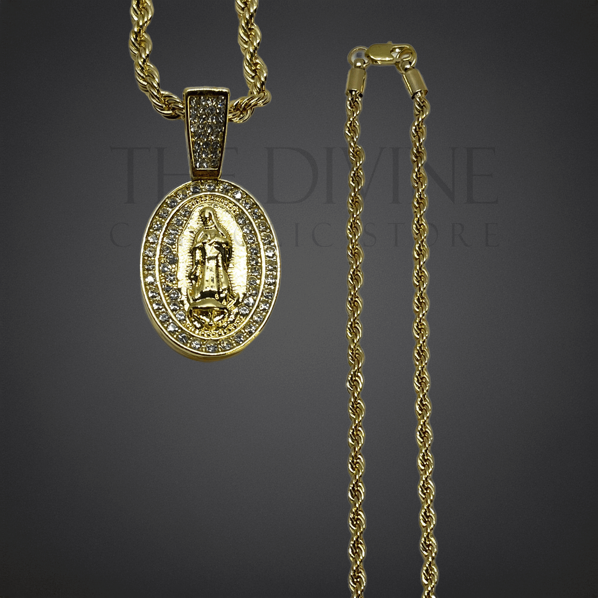 Guadalupe Rope Gold Stainless Steel Necklace with an oval pendant displaying Our Lady of Guadalupe, accented by radiant rhinestones, shown in a detailed close-up