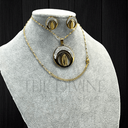 Our Lady of Guadalupe Moon Necklace and Earring Set in stainless steel, featuring a detailed pendant of the Virgin of Guadalupe against a crescent moon, with matching earrings, displayed on a neutral background.