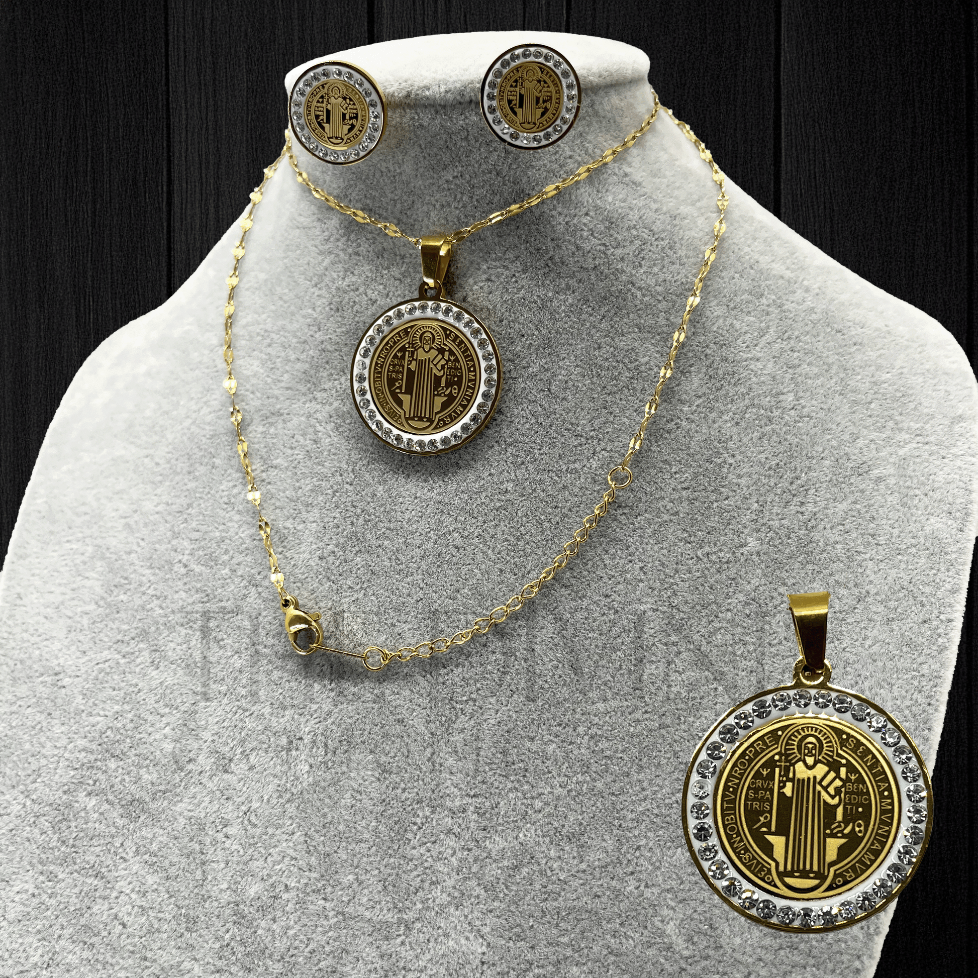 St. Benedict Necklace and Earring Set made of stainless steel, featuring a detailed St. Benedict medallion pendant and matching earrings, displayed on a neutral background.