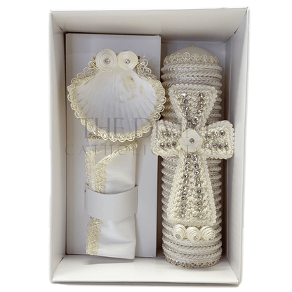 A sophisticated 3-piece baptism candle set consisting of a candle, towel, and shell. The candle is exquisitely wrapped in white fabric, accented with braided rope, delicate floral details, and shimmering rhinestones, symbolizing purity and grace. The towel and shell complete the ceremonial set, ideal for a memorable baptism event.