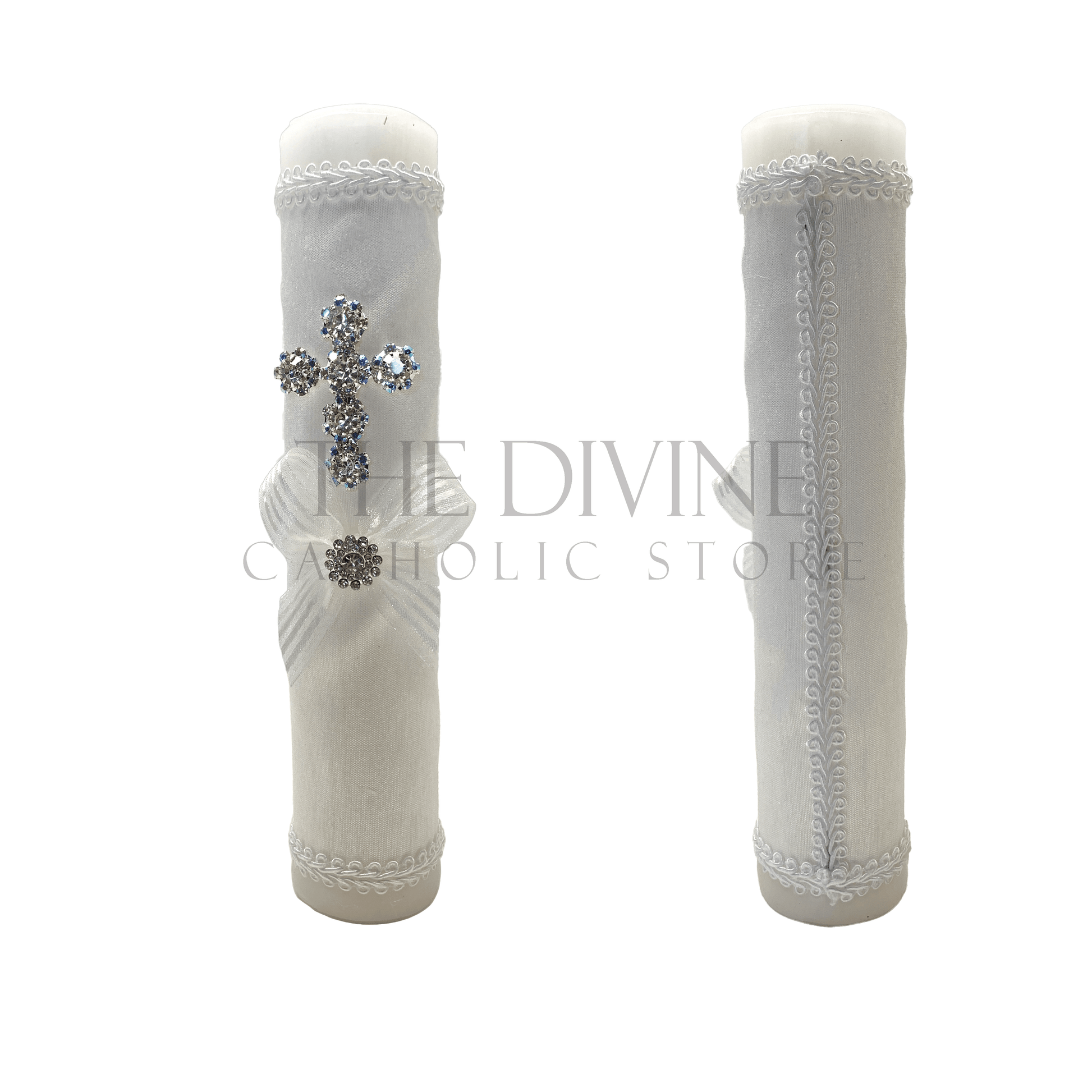 Single baptism candle, wrapped in white fabric, embroidered in white nylon thread, white ribbon, with crystal rhinestone and rhinestone cross, showing front view and back view.